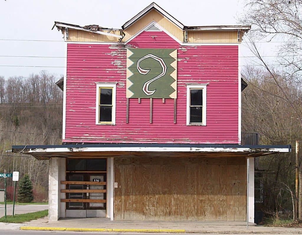 Question Mark Sign On Hobson's Old Building, Corner Of Henry & Main (Honor, MI)
