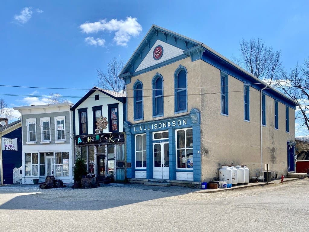 A rural general store on a small-town main street, hand-painted signage, bright sky — the kind of business local SEO is supposed to find.